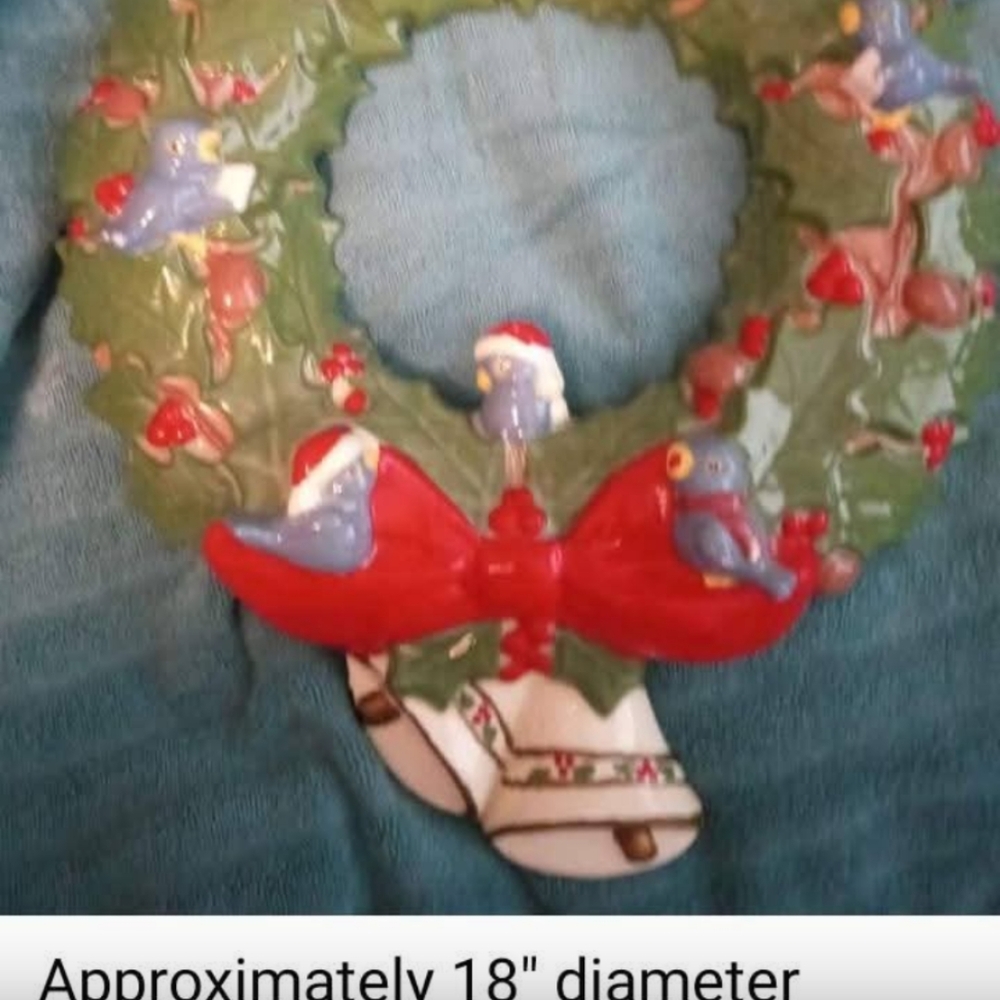 Festive Holiday Wreath with Red Bow and Blue Birds